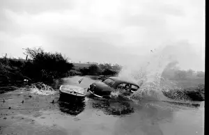 Stuntman attempts to fly car over river