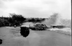 Stuntman attempts to fly car over river