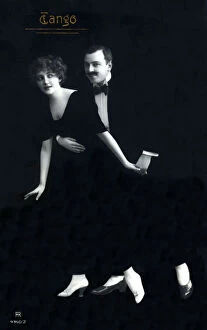 Tango Gallery: A stylish finely-dressed German couple dancing the Tango. Date: circa 1914