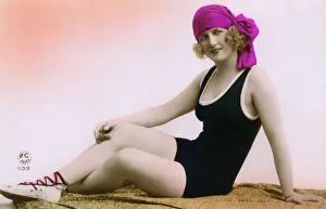Controversial Prints: Stylish French Fashion model in swimwear and pink headscarf