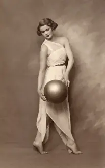 Stylish girl posing with ball