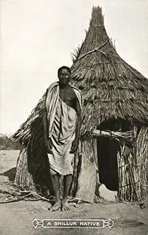 Tribesman Prints: Sudan - A Shilluk man outside his house