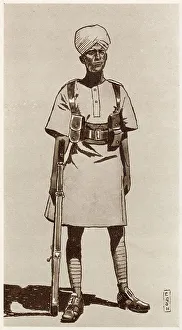 A Sudanese member of the Eastern Arab Corps. Armed with a Lee-Enfield rifle. The Eastern Arab Corps were part of the British influenced forces of Central Africa in the early 20th century. Date: 1936