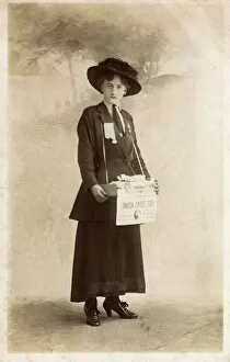 Suffragette selling badges