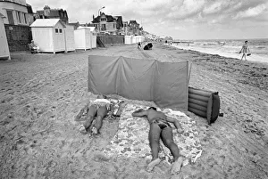 Sunbathers Prints: Sunbathers on the beach at Langrune Sur Mar, Normandy
