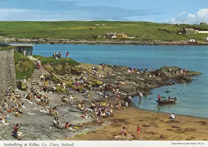 Sunbathing at Kilkee County Clare, Republic of Ireland