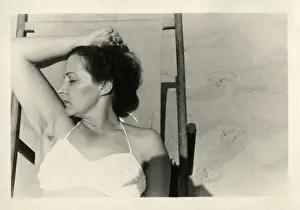 Sunbathing lady on a deckchair - British Seaside Coast