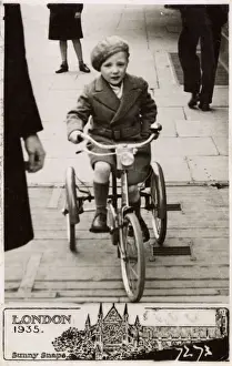 Candid Prints: Sunny Snaps - London - Young boy on a Tricycle
