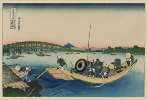 Sunset across the Ryogoku Bridge over the Sumida River at On