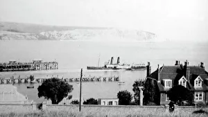 Swanage Prints: Swanage pier and paddle steamer, early 1900s