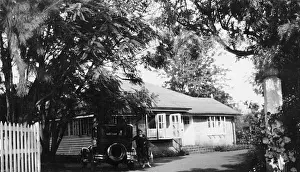 Jewell Prints: Sydney Jewell with car outside RSOs house, Nairobi, Kenya