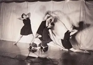 Tableau against backdrop with lamps