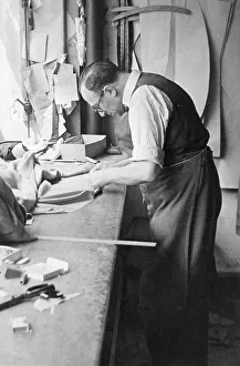 Tailor at work on a garment