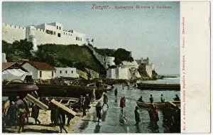 Tangier, Morocco - Loading and unloading bulls and wood