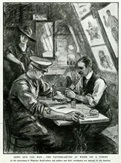 Tattoo Collection: Tattoo-artist, George Burchett, at work on a Tommy