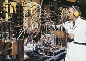 Adjusts Gallery: A technician adjusts delicate pipework