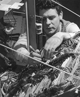Wiring Gallery: A technician works on a wiring system