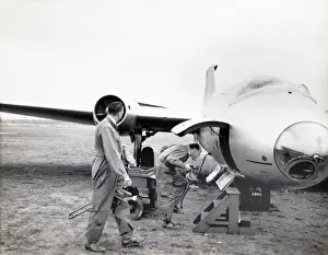 Scorpion Prints: Two technicians beside WK163 one looks inside the engine hat