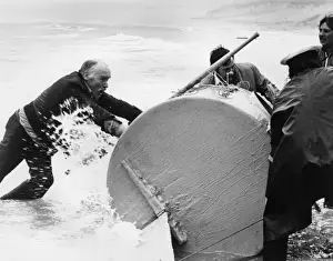 Barrel Prints: Ted McNamara retrieving barrel, Sennen Cove, Cornwall