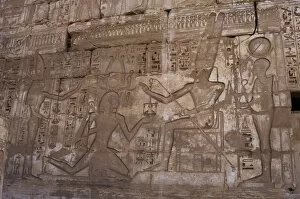 Amon Gallery: Temple of Ramses III. Pharaoh between Amun and Ptah. Egypt