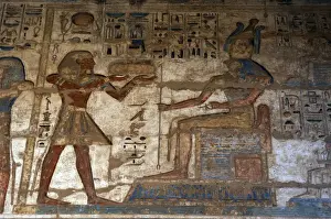 Sacred Prints: Temple of Ramses III. The pharaoh making offerings to god Ho