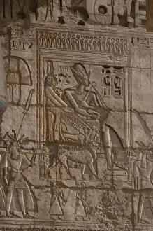 Rameses Prints: Temple of Ramses III. Ramses III wearing Khepresh being carr