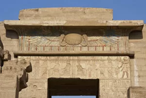 Temple of Ramses III. Winged sun relief as a symbol of prote