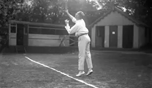 Tennis player serving
