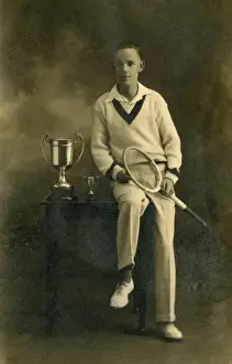 Tennis player with trophy