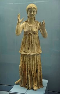 Terracotta figure of young woman. Tomb in Canosa, Apulia. 30