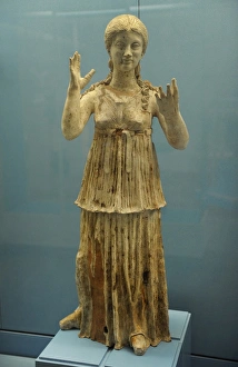 Terracotta figure of young woman. Tomb in Canosa, Apulia. 30 Terracotta figure of young woman. Tomb in Canosa, Apulia. 30