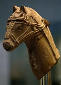 Terracotta head of a horse wearing a harness, part of a larg