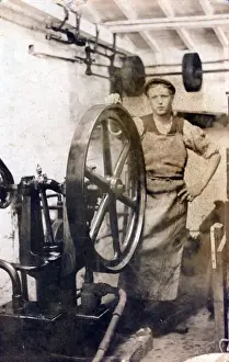 Textile Mill Worker and Machinery