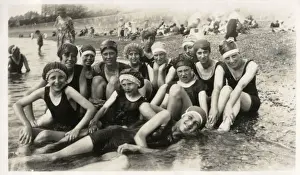 Thirteen Prints: Thirteen seaside bathers in swimming costumes and caps