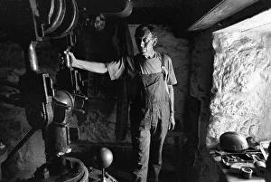 Former tin miner in the abandoned Levant tin mine Former tin miner in the abandoned Levant tin mine