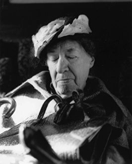 Images Dated 26th May 2017: Tired elderly woman on a train