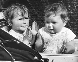 Prams Prints: Two toddlers in a pram