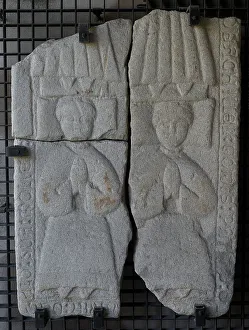 Tombstone with relief depicting two praying figures