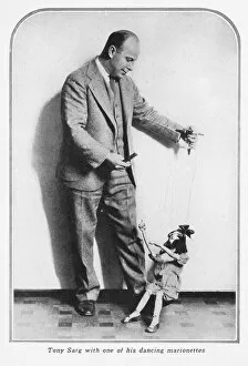Americas Collection: Tony Sarg and one of his dancing marionettes, 1928