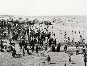 Tourist & bathers, bathing cars on beach at Ostend, Belgium