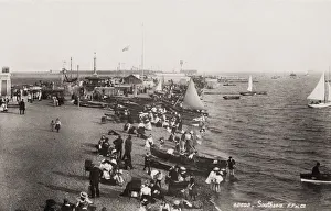 Rowboat Prints: Tourists on the beach at Southsea, England