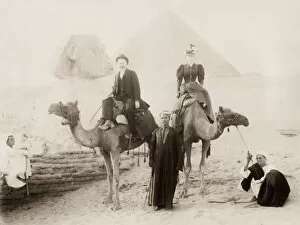 Safari Collection: Tourists on camels with guides visiting the Sphinx
