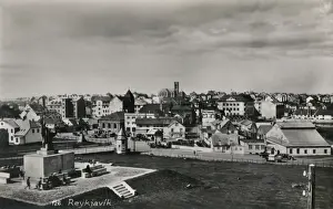 Town panorama and Arnarholl Statue, Reykjavik, Iceland