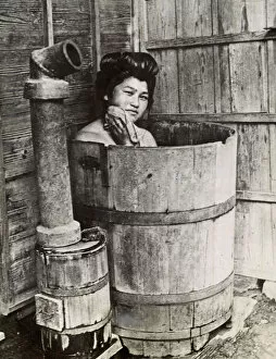 Images Dated 19th November 2015: Traditional Japanese bathing in upright wooden tub