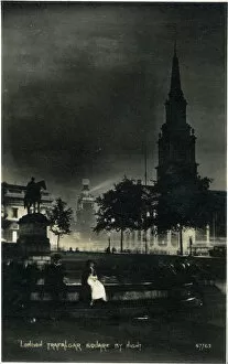 Images Dated 22nd April 2021: Trafalgar Squre by night, London. Date: circa 1909