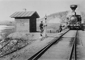 Approaches Prints: Train at Hilok