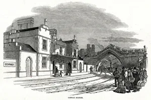 Train passing under arch into Conway railway station 1848 Train passing under arch into Conway railway station 1848