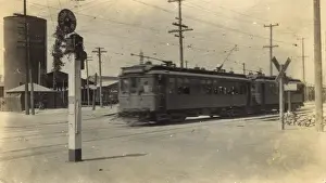 Train passing a railroad crossing, USA