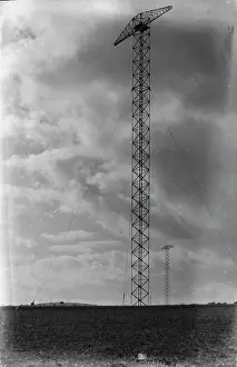 Structures Prints: Transmission Towers Against a Cloudy Sky