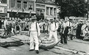 Images Dated 9th August 2019: Transporting cheeses - Alkmaar, the Netherlands